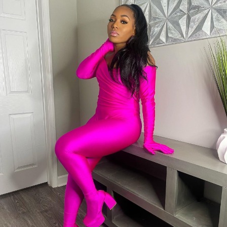Bria Epps in a fancy pink outfit.